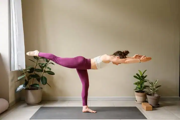 Woman doing Yoga exercise Herne Bay to help with toning the body. 